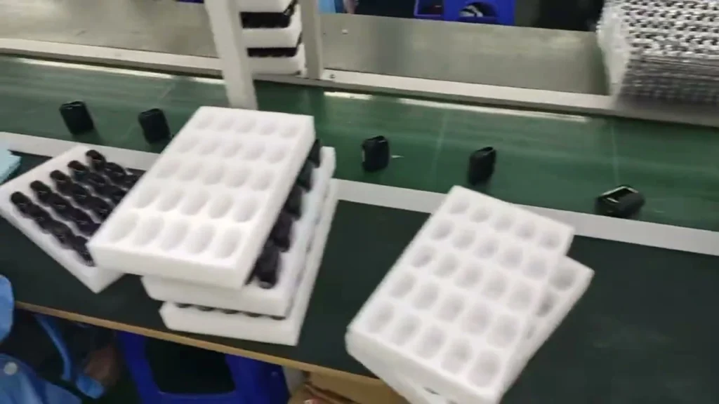 Finished empty vape hardware units being checked and filmed before packing