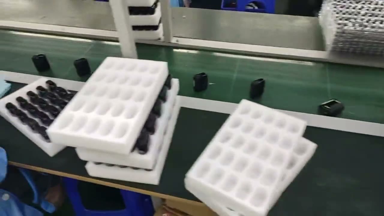 Finished empty vape hardware units being checked and filmed before packing