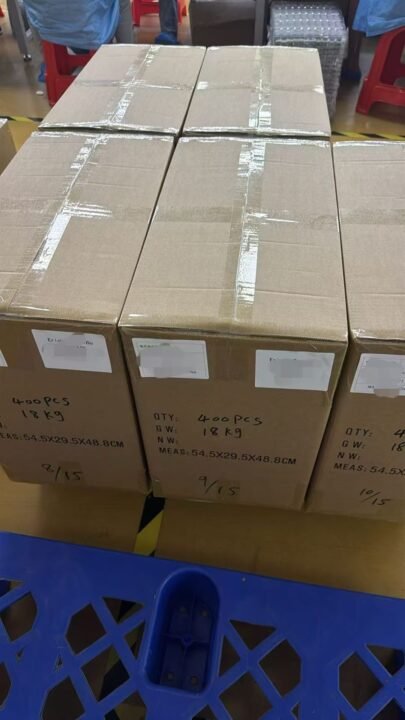 Sealed master cartons in the packing area of our manufacturing partner's Shenzhen production facility