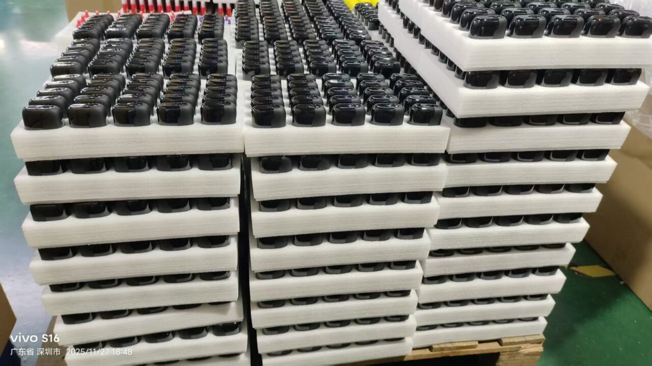 Empty CBD vape hardware units arranged in foam trays before packing